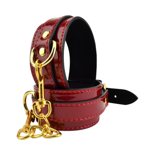 Fermacaviglie Bound to Please con dettagli in metallo dorato
